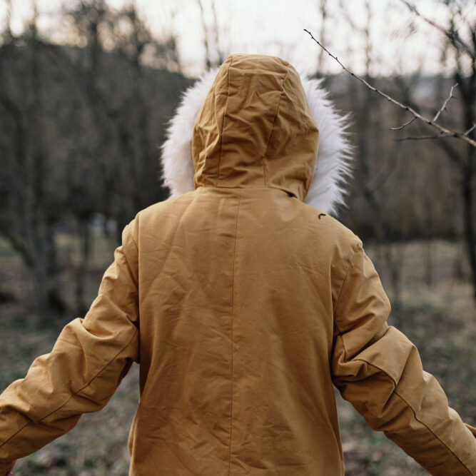 woman in jacket autumn nature